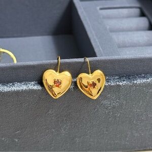 Emma Pills Gold Heart Earrings with Red Gem